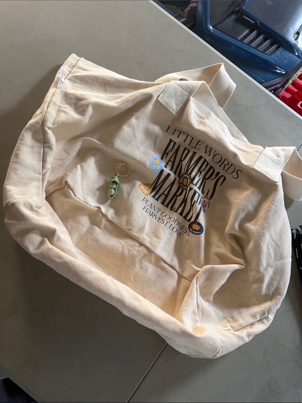 Little Words Project Farmers Market Canvas Tote Bag in Cream with Oea Bag Charm